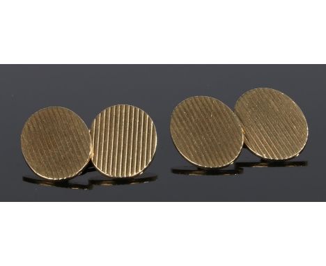 Pair 9 carat gold cufflinks, with engine turned oval faces, 11 grams