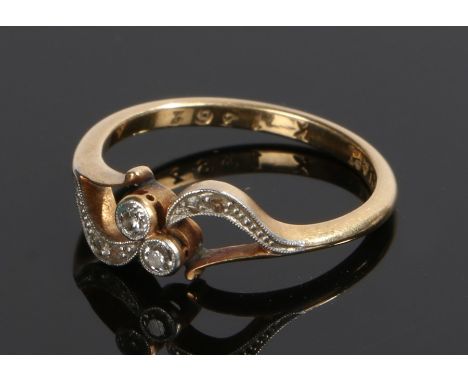 18 carat gold diamond set ring, the leaf design head set with six diamonds, ring size K