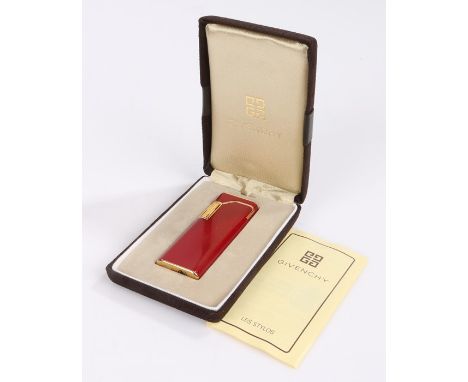 Givenchy lighter, in red and signed to the bottom, boxed and paperwork 