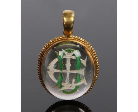 Victorian rock crystal and enamel pendant, with the enamel initials held inside the cabochon cut rock crystal, 31mm high excl