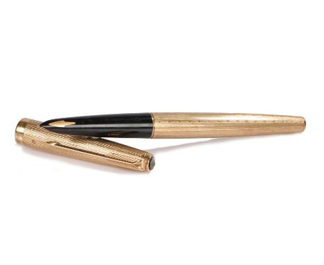 9 carat gold Parker fountain pen, with an engine turned case and vacant cartouche
