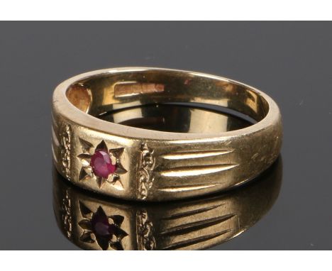 9 carat gold ruby set ring, the head set with a round cut ruby in star mount, ring size R