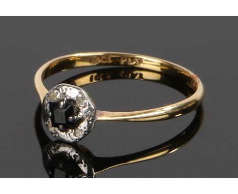 18 carat gold ring, with flower form platinum mount set with diamond surround to the central sapphire, ring size N