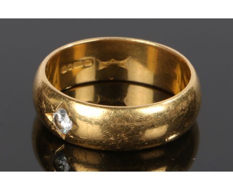 22 carat gold diamond set ring, the round cut diamond in a star setting, 9.6 grams, ring size R