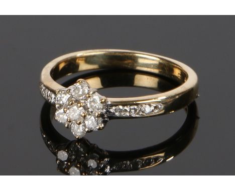 9 carat gold diamond set ring, the flower form head set with diamonds ring size O