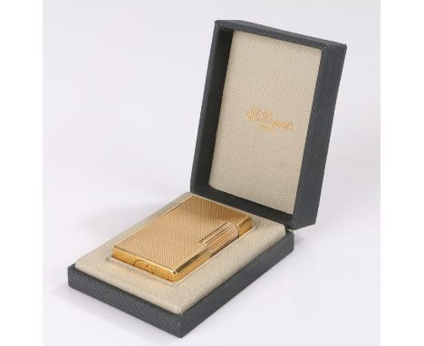 S.T. Dupont cigarette lighter, with gilt engine turned body, housed in original box