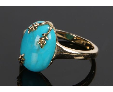 9 carat gold turquoise set ring, the cabochon cut turquoise with three overlapped leaf claws, P 