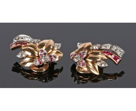 Pair of diamond and ruby set earrings, in the form of flowers set with rubies and diamonds, 22mm long, 9.3 grams