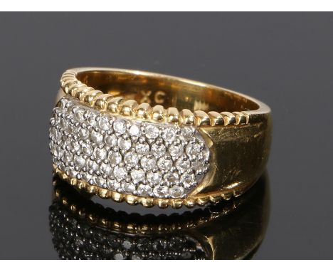 18 carat gold diamond set ring, with a cluster of round cut diamonds to the wide head, ring size M