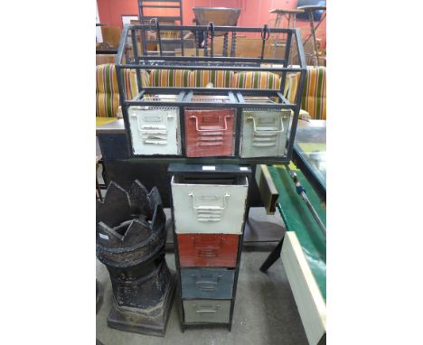 An industrial style painted aluminium bank of drawers and a hanging wall shelf 