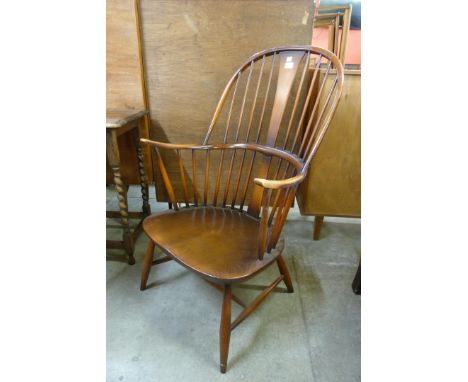 An Ercol Golden Dawn elm and beech Chairmaker's armchair 