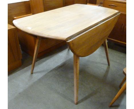 An Ercol elm and beech Windsor drop-leaf table 