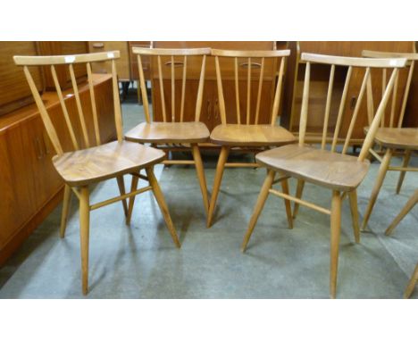 A set of four Ercol elm and beech 391 model chairs 