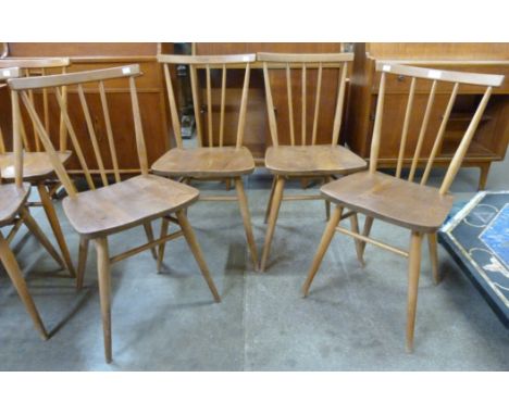 A set of four Ercol elm and beech 391 model chairs 
