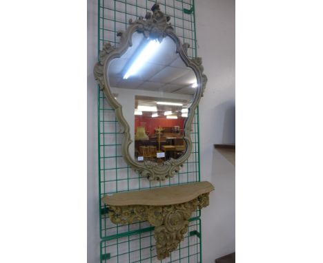 A French gilt framed mirror and shelf 