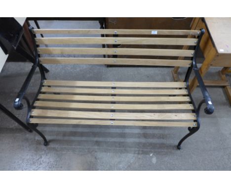 A cast iron ended garden bench 