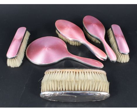 Five piece silver pink guilloche enamel dressing table set (all pieces have some enamel damage) plus a pair of silver backed 
