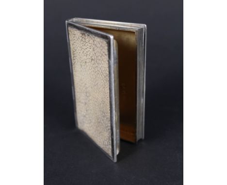 A silver and shagreen table snuff box in the form of a book with gilt interior, hallmarked London 1904 (some shagreen panels 