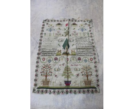 An 18th Century good quality needlework tree and calligraphy sampler, 17" x 11" (as found)
