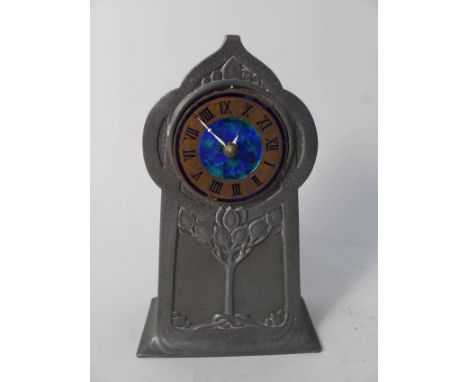 An Art Nouveau pewter mantel clock, Serial No.01144 (missing movement, glass and bezel)