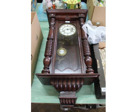 A mahogany Vienna wall clock