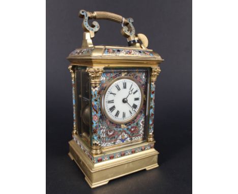 A French gilt metal and champleve enamel striking carriage clock