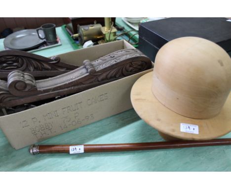 A wood Hatters mould, Victorian carved oak furniture moulds plus a walking stick with white metal grip