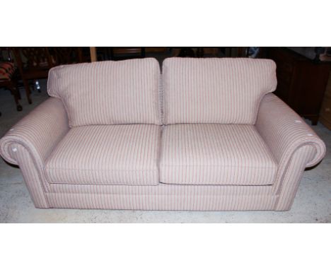 A Marks and Spencer two-seater sofa bed, 95cm high, 205cm wide, 100cm deep