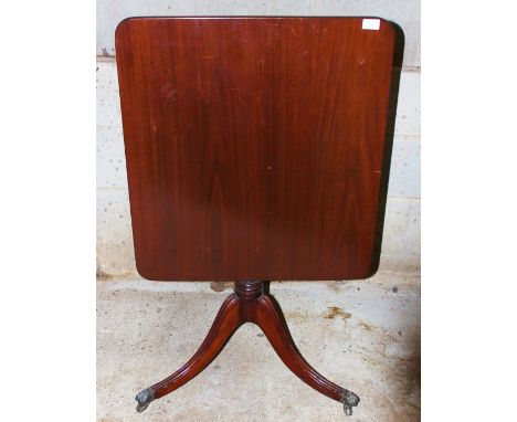 A 19th Century mahogany tripod table, tilt top, 71cm high
