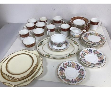 A mixed lot of china including Paragon Country Lane saucers, side plates, milk jug and sugar bowl, Elizabethan burgundy tea a