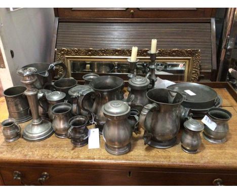 A collection of pewter including candlesticks, tankards, measures, jugs (candlestick: 21cm), some with Imperial pint stamps t