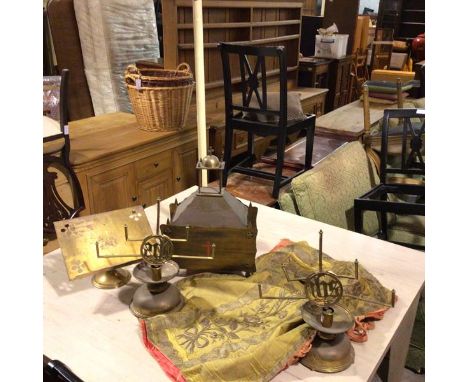A collection of ecclesiastical furnishings including a brass altar box with enamelled crucifix, a pair of candlestick bases w