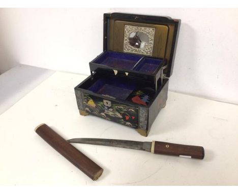 A Japanese musical jewellery box with mother of pearl and painted exterior, with a short Japanese sword with scabbard (36cm) 