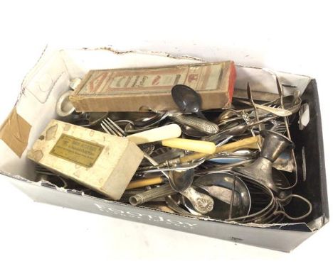 A large quantity of Epns including forks, knives, candleholders, caddy spoons, toast rack, sugar nips etc. (a lot)