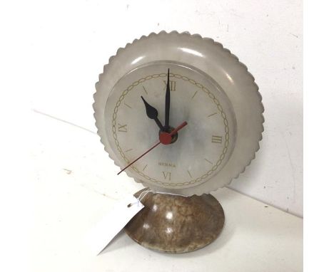 A Herna table clock, the dial and base composed of carved marble, with battery powered movement (23cm)