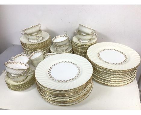 A part Minton dinner service including twenty six dinner plates (d.27cm), eight soup bowls, six tea cups, saucers, side plate