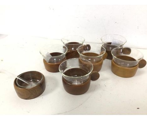 A set of six 1960s/70s German coffee cups, each with a wooden base and handle with glass insert, glass marked Schott &amp; Ge