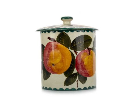 WEMYSS WARE LIDDED PRESERVE JAR, LATE 19TH / EARLY 20TH CENTURY of cylindrical form, hand painted with apples, within a green