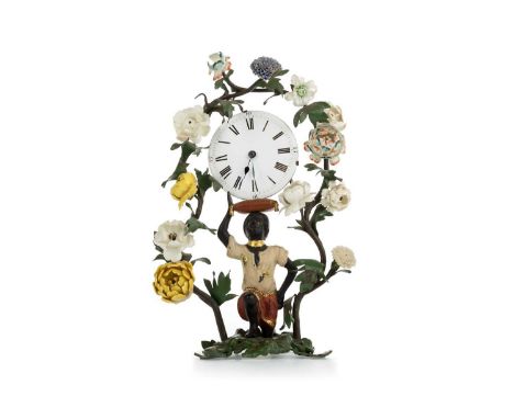 BLACKAMOOR BRONZE TABLE CLOCK, 19TH CENTURY the white enamel circular dial held above a kneeling figure, within a garland of 