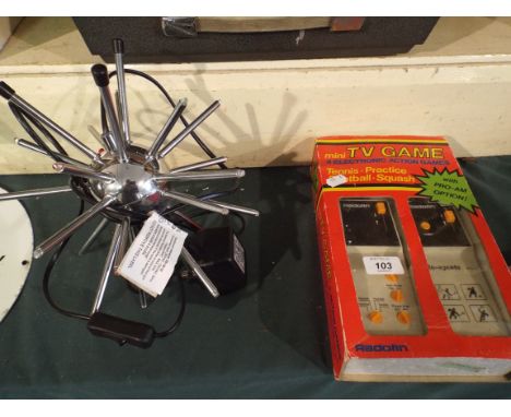 A Vintage Mini TV Game and Sputnik Table Lamp