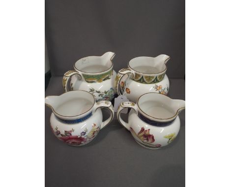 A Collection of Four Spode Floral Pattern Jugs 