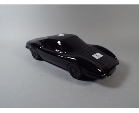 A Ceramic Model of A Sports Car 