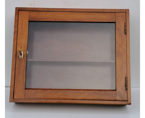 A late 19th century oblong hanging walnut display case with interior shelf and glazed door, with key, 52 x 43 x 11 cm