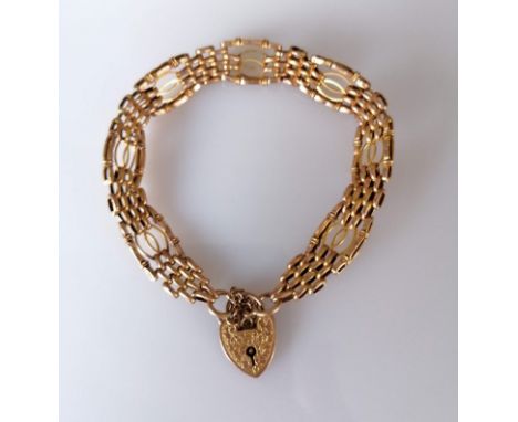 A 9ct rose gold fancy gate-link bracelet with lock, 17 cm, hallmarked, 7.56g