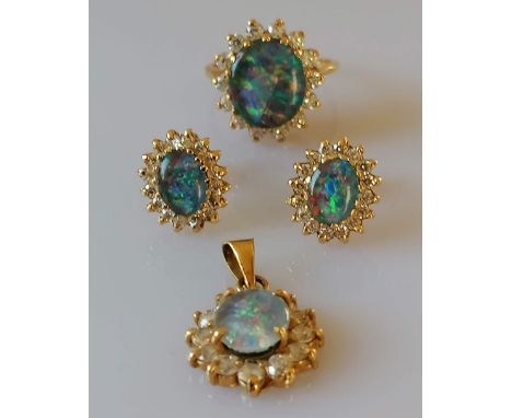 An 18ct yellow gold opal triplet cluster ring with cubic zirconia decoration, size K, opal 12 x 9mm with matching earrings (o