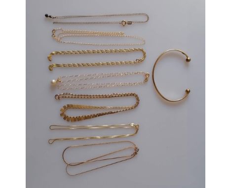 An assortment of seven gold neck chains, all clasps good and a gold bangle, all hallmarked 9ct, 15g