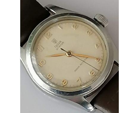A vintage Tudor Oyster gent's watch with Arabic gold numerals and hands, small rose motif, case 32mm, ref. 7803, signed to fa