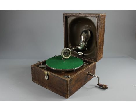 A Vintage Faux Leather Cased Decca Gramophone. With a 20.5 cms diameter turntable, aluminium horn, complete with winding hand