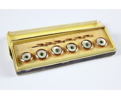 Six Gilt and Enamel Dress Studs, in the original box.