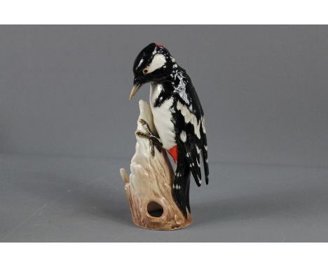 Goebel Porcelain Greater Spotted Woodpecker Figure; the woodpecker perched on a tree stump, approx 19 cns h.